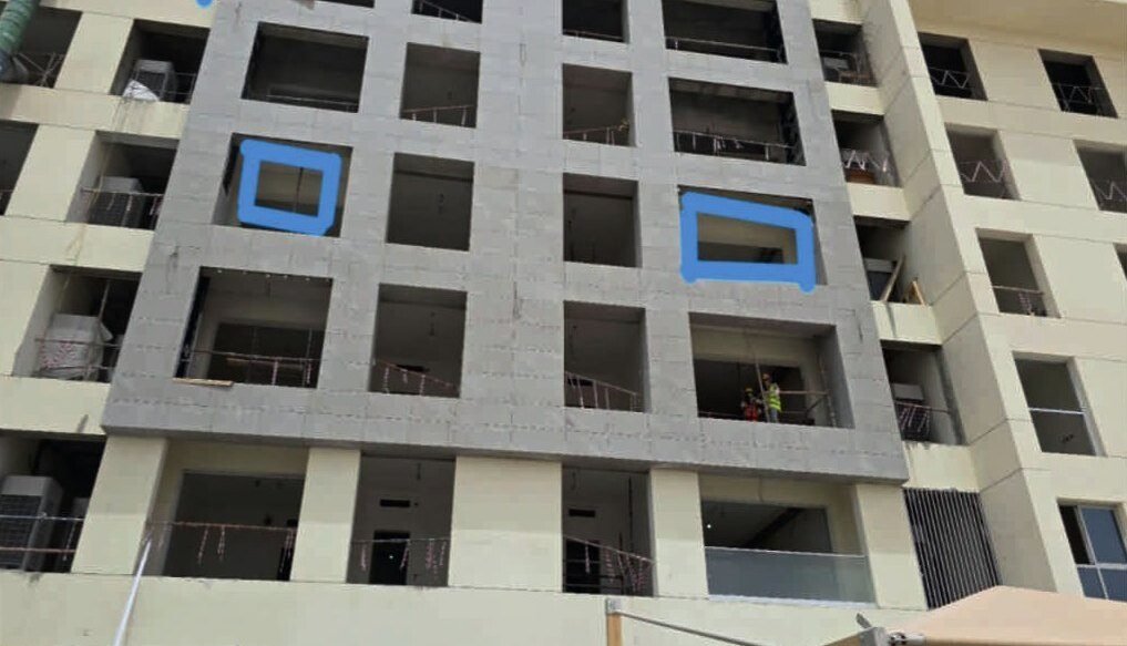 Completed institutional building, precast facade.