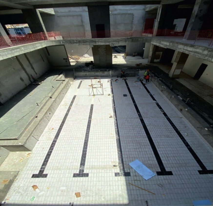 Pool tank — waterproofing and tile setting.